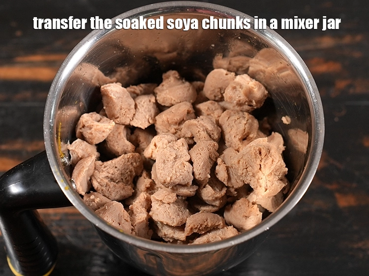 Step 9 – <p>Transfer the soaked soya chunks in a mixer jar.</p>