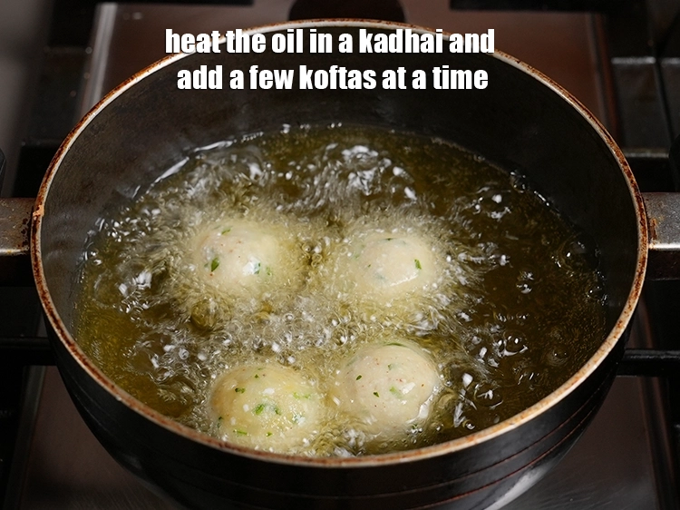 Step 13 – <p>Heat the oil in a kadhai and add a few koftas at a time.</p>