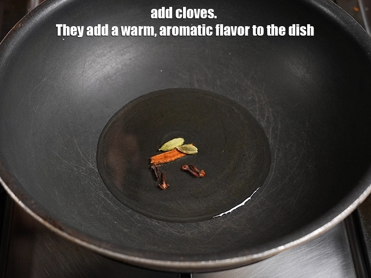 Step 27 – <p>Add 4 cloves. They add a warm, aromatic flavor to the dish.</p>