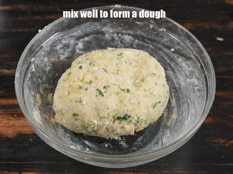 Step 11 – <p>Mix well to form a dough.</p>