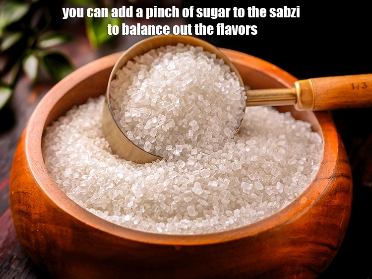 Step 38 – <p>You can add a pinch of sugar to the sabzi to balance out the flavors.</p>