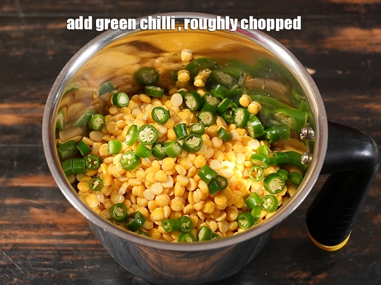 Step 10 – <p>Add the green chillies. Also, you can toss in ginger-garlic paste to perk up the …