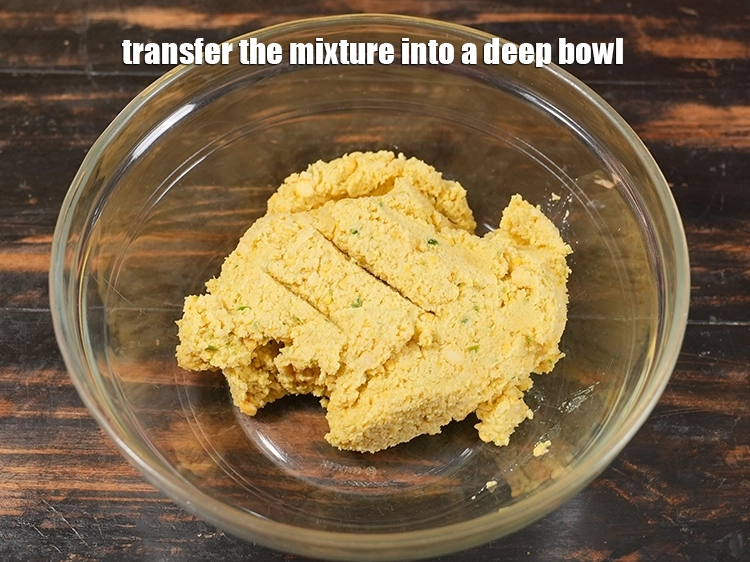 Step 12 – <p>Transfer the coarse dal mixture into a bowl.</p>