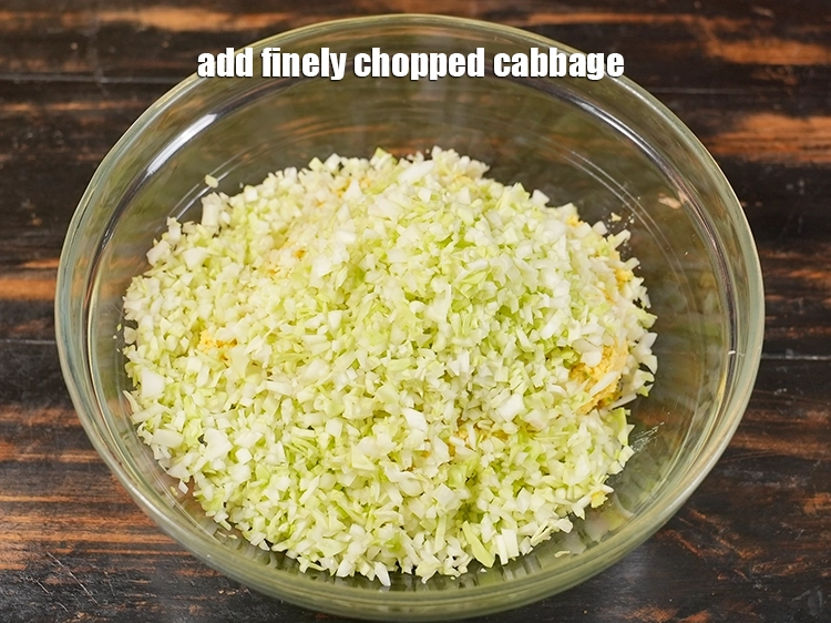 Step 27 – <p>Add the finely chopped cabbage. We have used green cabbage, you can also use red …