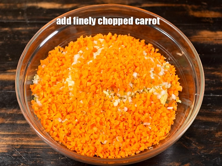 Step 14 – <p>Add the finely chopped carrots. This is optional but, you can always add veggies additionally …
