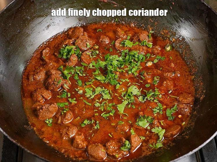 Step 33 – <p>Add <span style="background-color:rgb(255,255,255);color:rgb(0,0,0);">2 tbsp </span><a href="https://www.tarladalal.in/glossary-coriander-dhania-kothmir-369i#ing_3500"><u>finely chopped coriander</u></a><u>.</u></p>