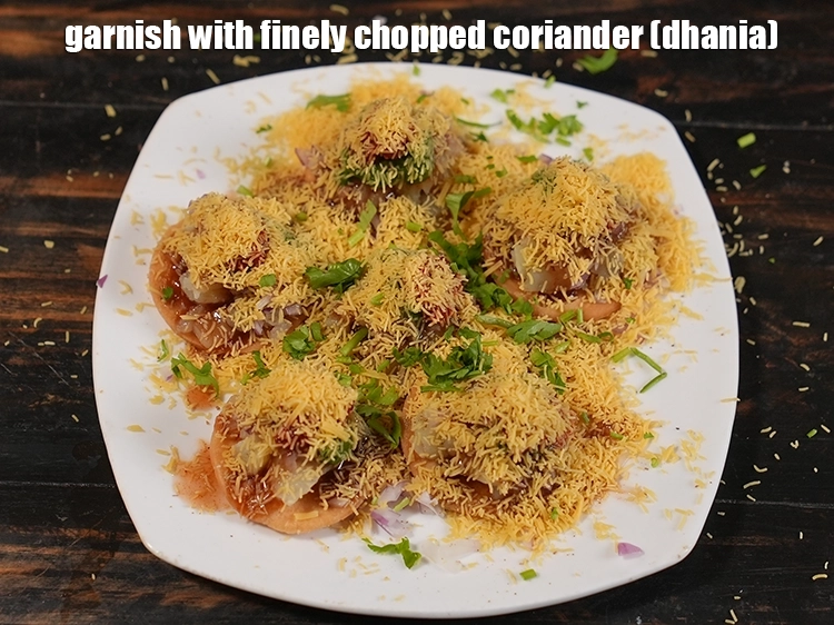 Step 13 – <p><span style="background-color:rgb(255,255,255);color:rgb(0,0,0);">Garnish with 1 tbsp of coriander.</span></p>