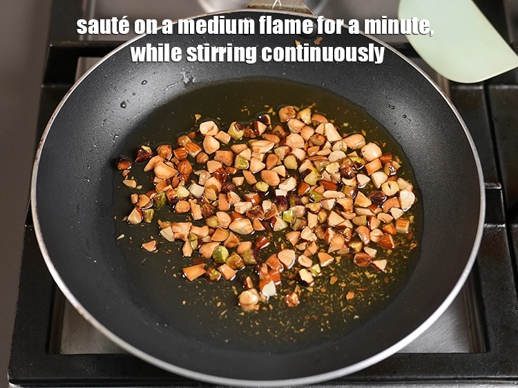 Step 10 – <p>Sauté on a medium flame for a minute, while stirring continuously. Keep aside.</p>
