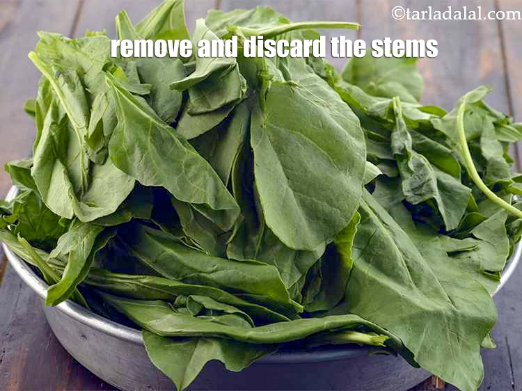 Step 13 – <p>Get rid of the the spinach stems and discard them.</p>