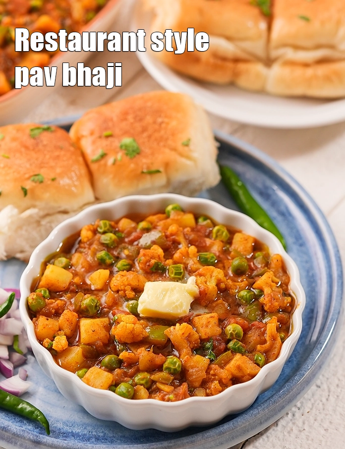 Step 17 – <p>Just before serving, re-heat the khada bhaji and serve with pavs, onions and lemon wedges.</p>