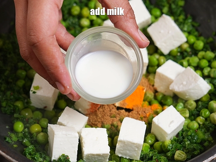 Step 46 – <p><span style="background-color:rgb(255,255,255);color:rgb(0,0,0);">Add 1 tbsp&nbsp;</span><a href="https://www.tarladalal.com/glossary-milk-doodh-full-fat-milk-buffalo-milk-full-cream-milk-514i"><u>milk</u></a><u>.</u></p>