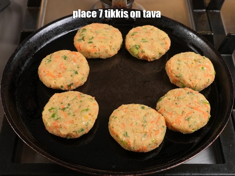 Step 24 – <p>Place 7 tikkis on tava.</p>