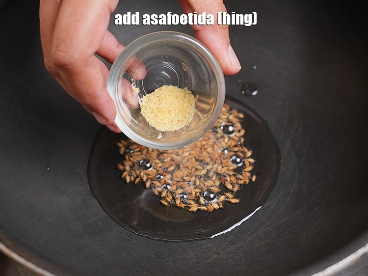 Step 36 – <p>Add 1/4 tsp&nbsp;<a href="https://www.tarladalal.com/glossary-asafoetida-hing-113i">asafoetida (hing)</a>.</p>