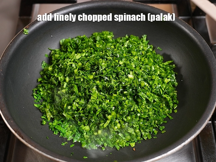 Step 38 – <p>Add 5 cups&nbsp;finely&nbsp;<a href="https://www.tarladalal.com/glossary-chopped-spinach-780i">chopped spinach (palak)</a>.</p>