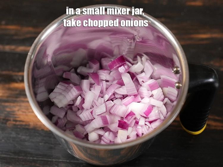 Step 13 – <p>In a small mixer jar, take <span style="background-color:rgb(255,255,255);color:rgb(0,0,0);">1 cup </span><a href="https://www.tarladalal.in/glossary-onions-pyaz-pyaaz-kanda-548i#ing_2327"><u>chopped onion</u></a>.</p>