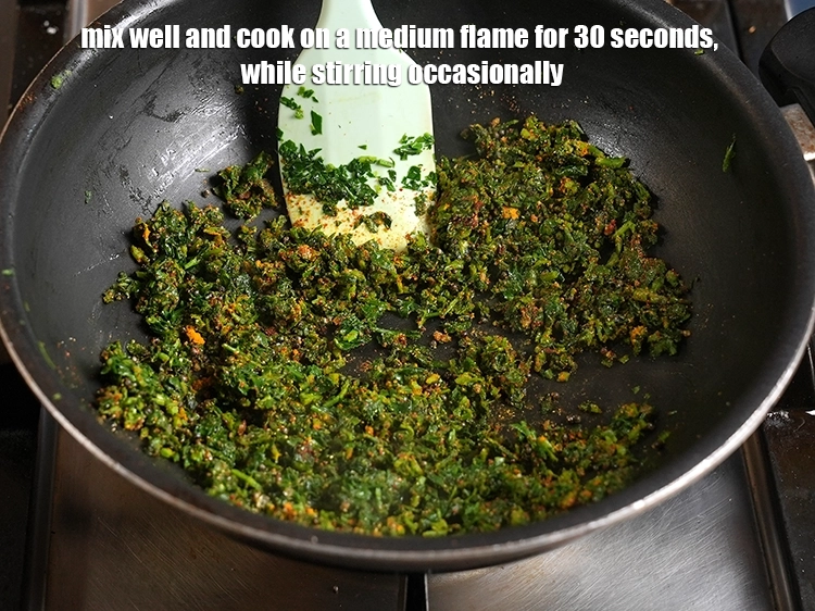 Step 18 – <p>Mix well and cook on a medium flame for 30 seconds, while stirring occasionally.</p>