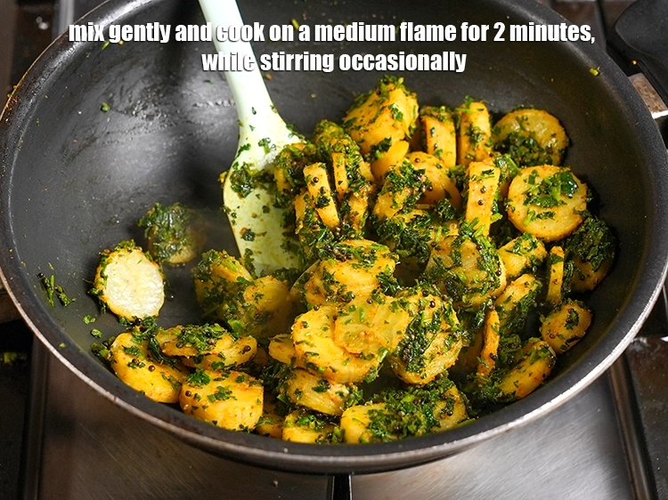 Step 20 – <p>Mix gently and cook on a medium flame for 2 minutes, while stirring occasionally.</p>