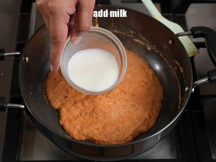 Step 26 – <p><span style="background-color:rgb(255,255,255);color:rgb(0,0,0);">Add the 1/4 cup </span><a href="https://www.tarladalal.in/glossary-milk-doodh-full-cream-milk-514i"><u>milk</u></a><u>.</u></p>