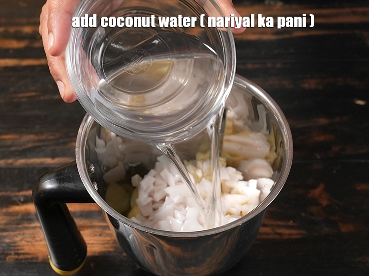 Step 3 – <p>Add <span style="background-color:rgb(255,255,255);color:rgb(0,0,0);">1 cup </span><a href="https://www.tarladalal.in/glossary-coconut-water-nariyal-pani-nariyali-paani-273i"><u>coconut water (nariyal ka pani)</u></a><u>.</u></p>