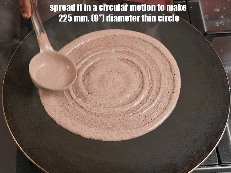 Step 19 – <p>Spread it in a circular motion to make a 225 mm. (9”) diameter thin circle.</p>