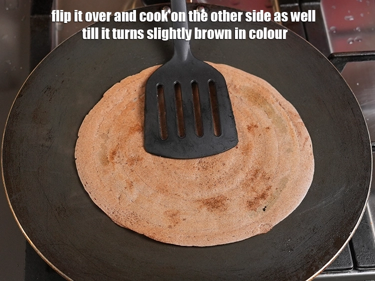 Step 22 – <p>Flip it over and cook on the other side as well till it turns slightly …