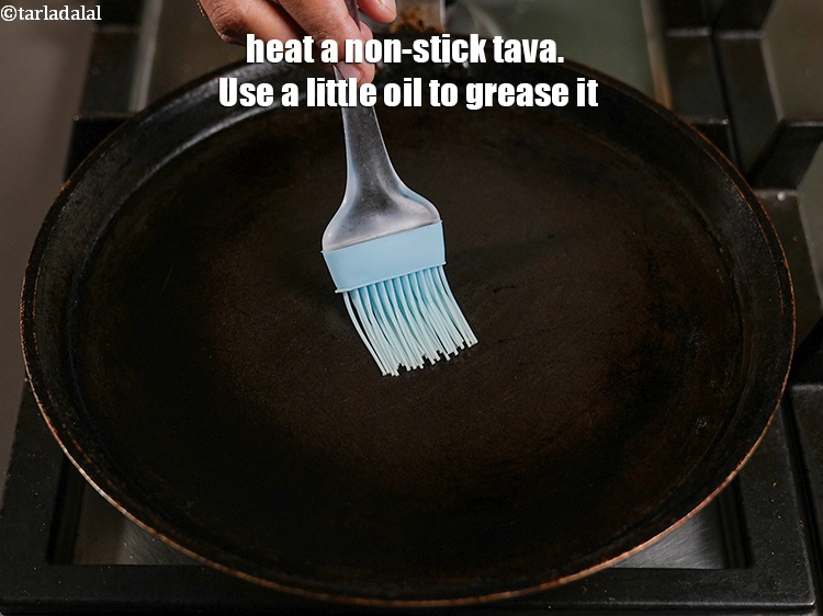 Step 21 – <p>To prepare <strong>masala dosa</strong>, heat a tava /non-stick tava (griddle). <span style="background-color:rgb(255,255,255);color:rgb(0,0,0);">Grease it lightly with …