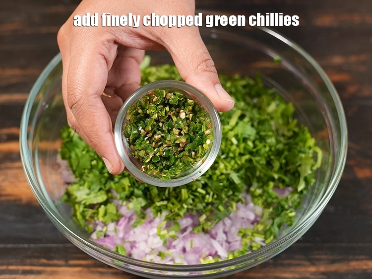 Step 28 – <html><head></head><body><p>Add&nbsp;2 tablespoons finely&nbsp;<a href="glossary-chopped-green-chilli-820i">chopped green chillies</a>.</p></body></html>