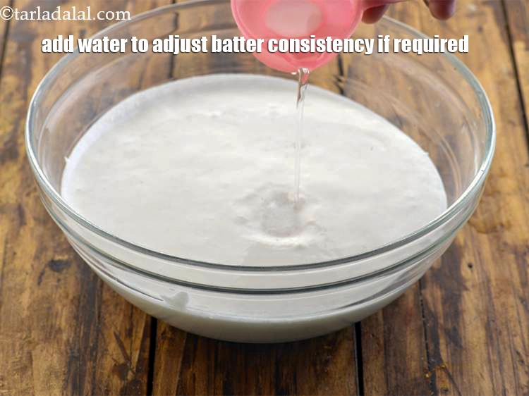 Step 47 – <p>Add a little water to adjust the consistency of dosa batter. It shouldn't be too …