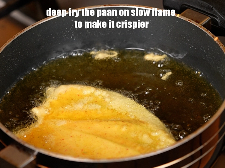 Step 28 – <p>Deep fry the paan on slow flame to make it crispier.&nbsp;</p>