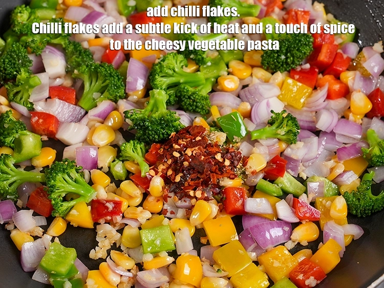 Step 10 – <p>Add 1 tsp <a href="https://www.tarladalal.in/glossary-dry-red-chilli-flakes-paprika-338i"><u>dry red chilli flakes (paprika)</u></a>. Chilli flakes add a subtle kick …