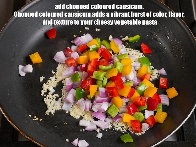 Step 5 – <p>Add ½ cup <a href="https://www.tarladalal.in/glossary-coloured-capsicum-coloured-bell-pepper-2798i#ing_2744"><u>chopped coloured capsicum</u></a>. Chopped coloured capsicum adds a vibrant burst of …