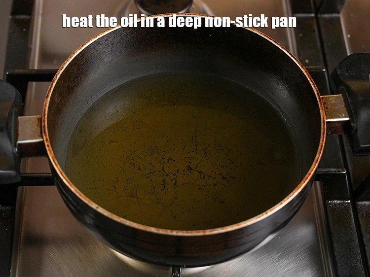Step 12 – <p>Heat the oil in a deep non-stick pan.</p>