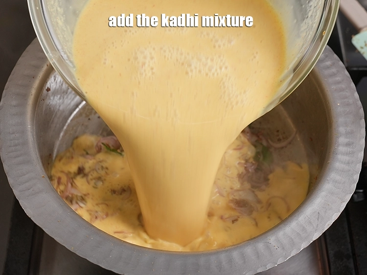 Step 52 – <p><span style="background-color:rgb(255,255,255);color:rgb(0,0,0);">Add the kadhi mixture.</span></p>