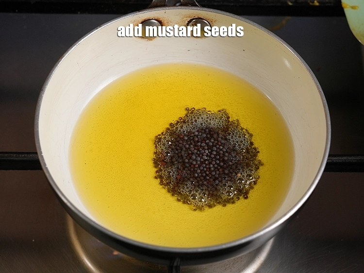 Step 40 – <p>Switch off the flame and add 1 tsp mustard seeds.</p>