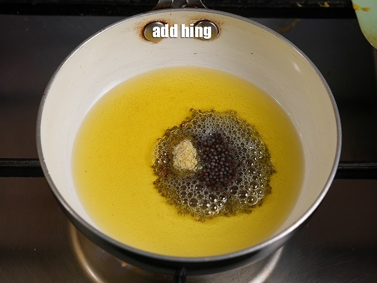 Step 41 – <p>Add a pinch of hing.&nbsp;</p>