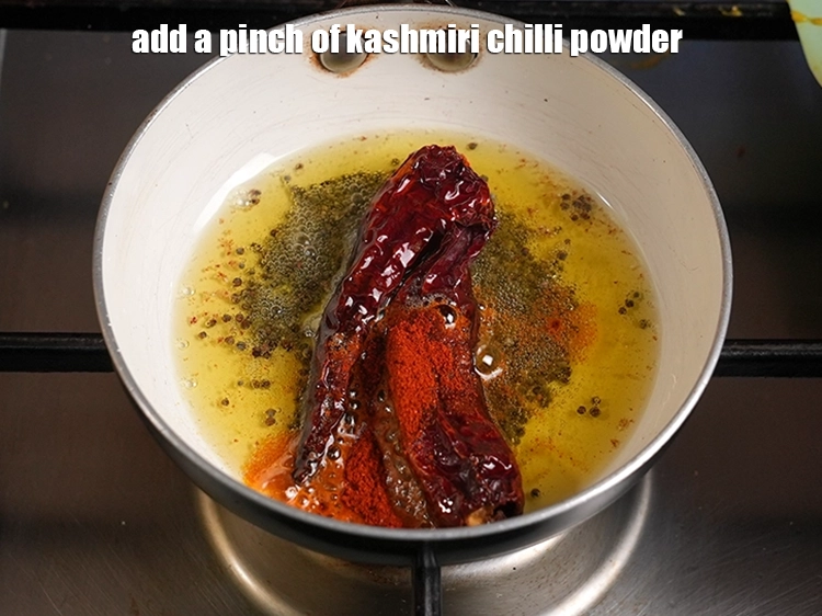 Step 43 – <p>Add a pinch of <a href="https://www.tarladalal.in/glossary-chilli-powder-red-chilli-powder-339i#ing_3363"><u>Kashmiri red chilli powder</u></a>.</p>