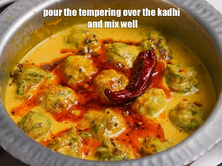 Step 45 – <p>Pour the tempering over the kadhi.</p>