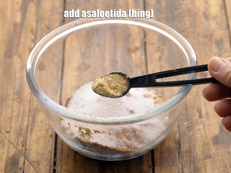 Step 12 – <p>Add asafoetida. Though in less quantity, it is required to balance all the flavours in&nbsp;<strong>chaat …