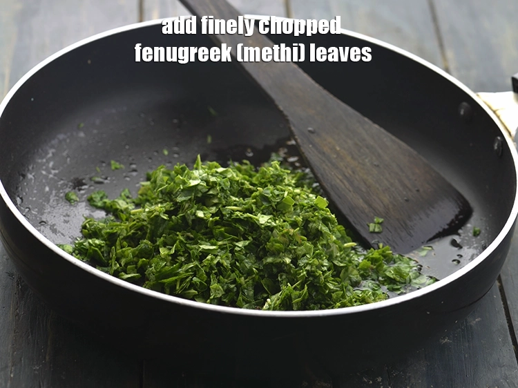 Step 11 – <p>When the seeds crackle, add the fenugreek leaves. Fresh methi leaves tastes the best but, …