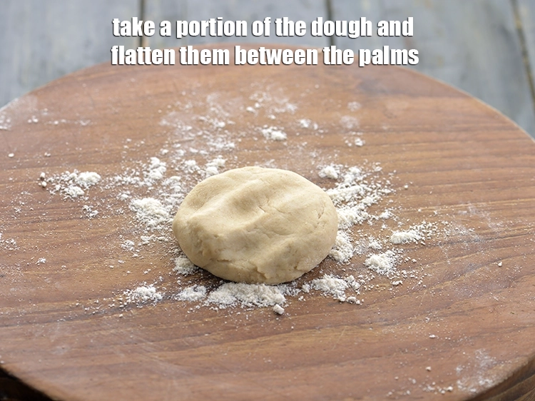 Step 20 – <p>To make the <strong>methi aloo paratha</strong>, take a portion of the dough and flatten them …