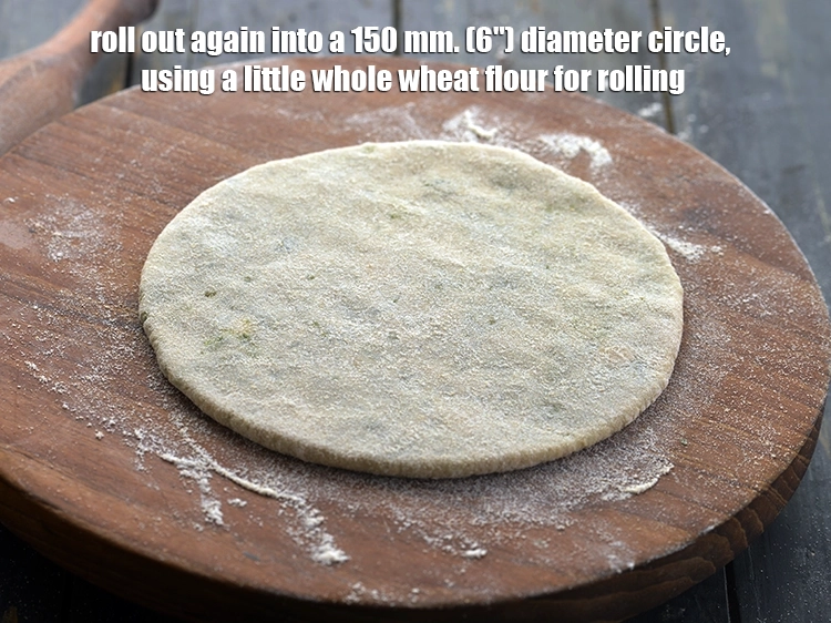 Step 24 – <p>Roll out again into a 150 mm. (6") diameter circle, using a little whole wheat …