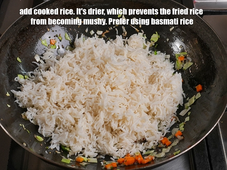 Step 12 – <p>Add 4 cups of <a href="https://www.tarladalal.in/glossary-long-grain-rice-basmati-chawal-basmati-rice-535i#ing_2891"><u>cooked long grain rice (Basmati chawal)</u></a>. It's drier, which prevents …