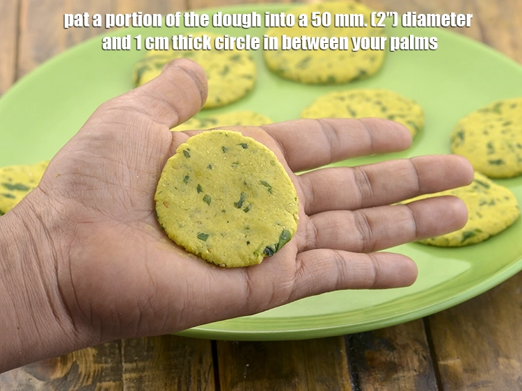 Step 22 – <p>Pat a portion of the dough into a 50 mm. (2”) diameter and 1 cm …