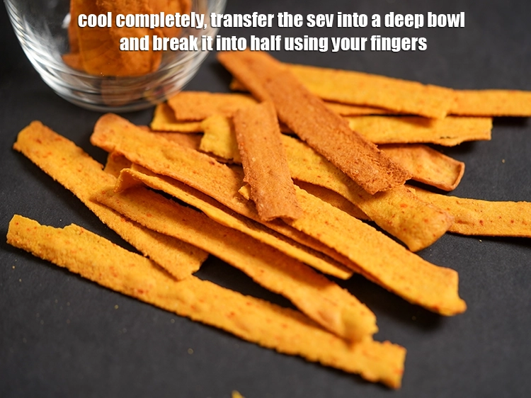 Step 22 – <p>Cool completely, transfer the sev into a deep bowl and break it into half using …