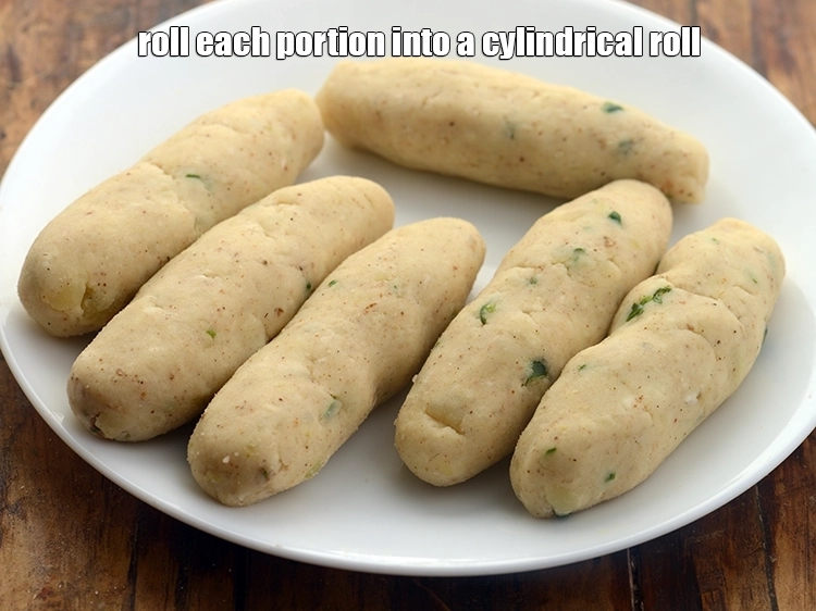 Step 23 – <p>Roll each portion into a cylindrical roll. You can even make round tikki if not …