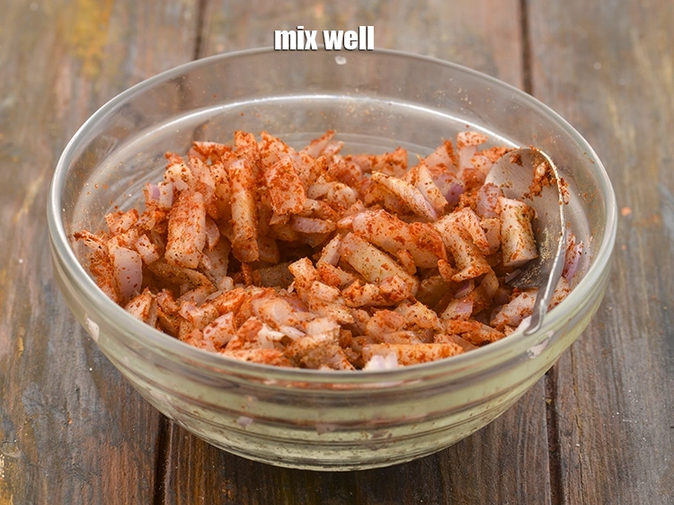 Step 49 – <p><span style="background-color:rgb(255,255,255);color:rgb(0,0,0);">Mix well. This onion masala mixture is a crunchy element of </span><strong>aloo cheese frankie.</strong></p>