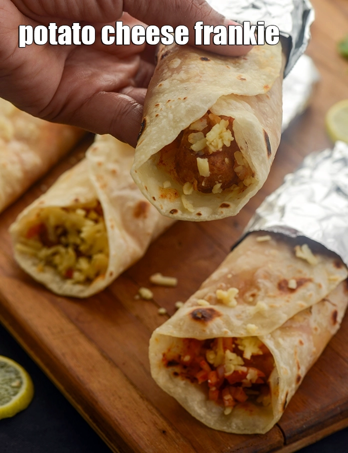 Step 46 – <p>Serve&nbsp;<strong>aloo cheese frankie | potato cheese frankie | cheesy potato Indian wrap |</strong>&nbsp;immediately. You can …