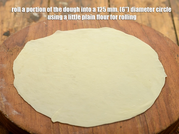 Step 9 – <p><span style="background-color:rgb(255,255,255);color:rgb(0,0,0);">Roll a portion of the dough into a 125 mm. (6”) diameter circle using …