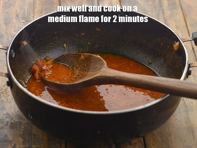 Step 24 – <p><span style="background-color:rgb(255,255,255);color:rgb(0,0,0);">Mix well and cook on a medium flame for 2 minutes, while stirring occasionally.</span></p>