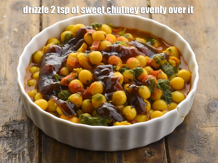 Step 32 – <p>Also, drizzle 2 tsp of <a href="https://www.tarladalal.com/sweet-chutney-quick-sweet-chutney-395r"><strong>sweet chutney</strong></a> evenly over it. The quantity of all …